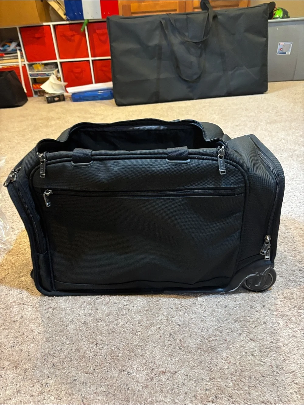 Tumi Black Rolling Carry-On Duffel with Wheels and handle